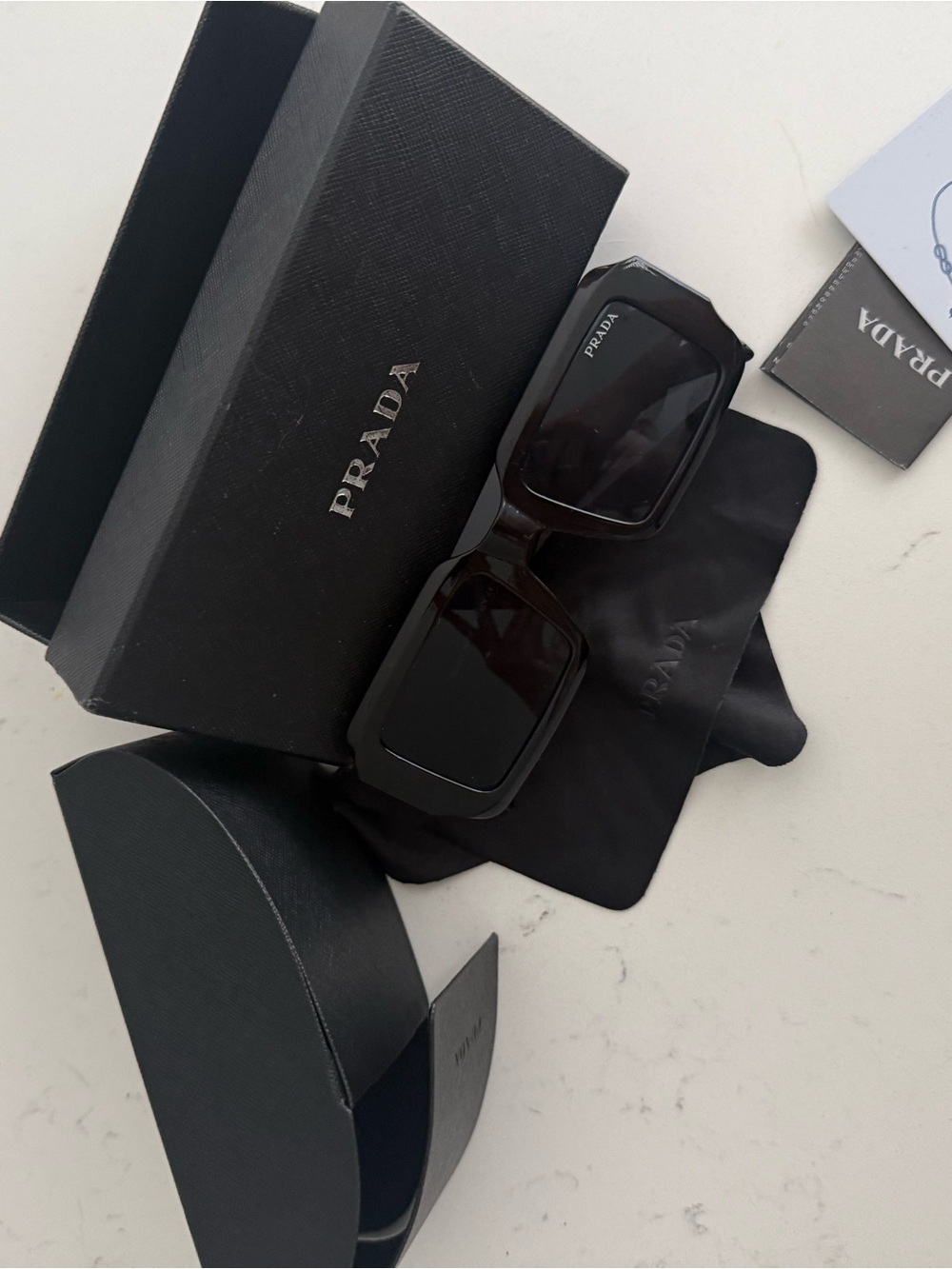 Prada Glossy Black Rectangular Sunglasses for women